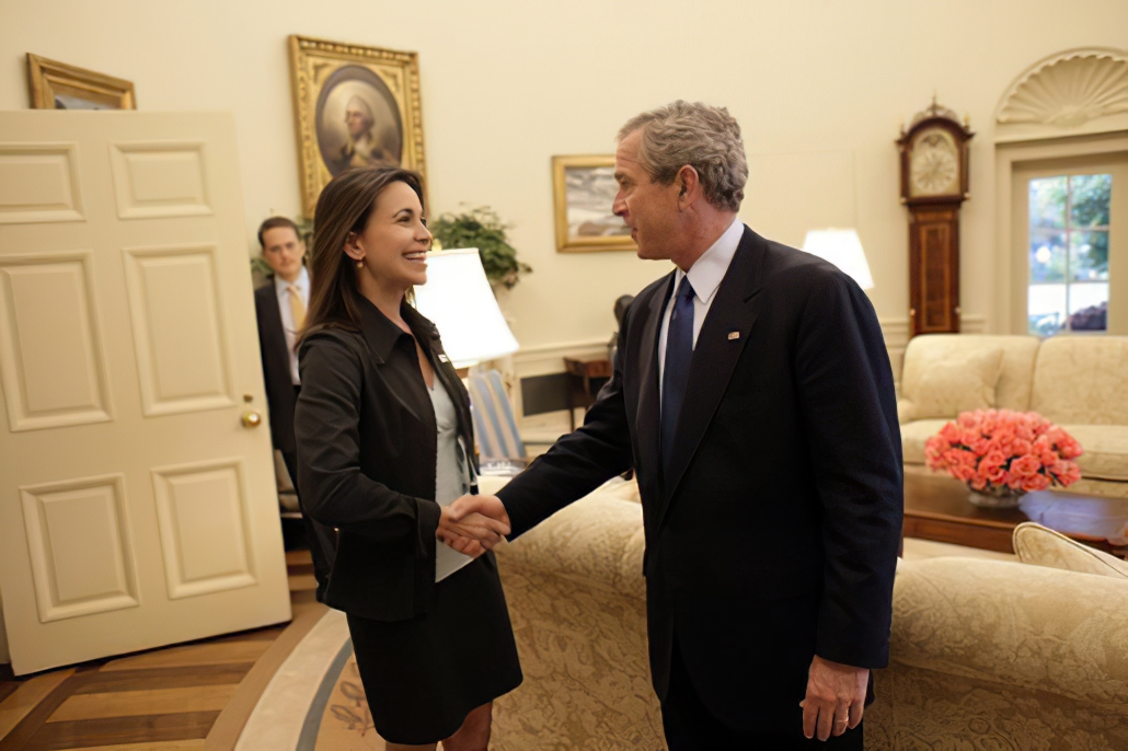 1310 President Bush: Meeting with the Executive Director of the Venezuelan Civil Society Group Sumate. Oval Office. resident George W. Bush met on May 31, 2005 with Maria Corina Machado, the Founder and Executive Director of Sumate.  Sumate is an independent democratic civil society group in Venezuela.  White House photo by Eric Draper